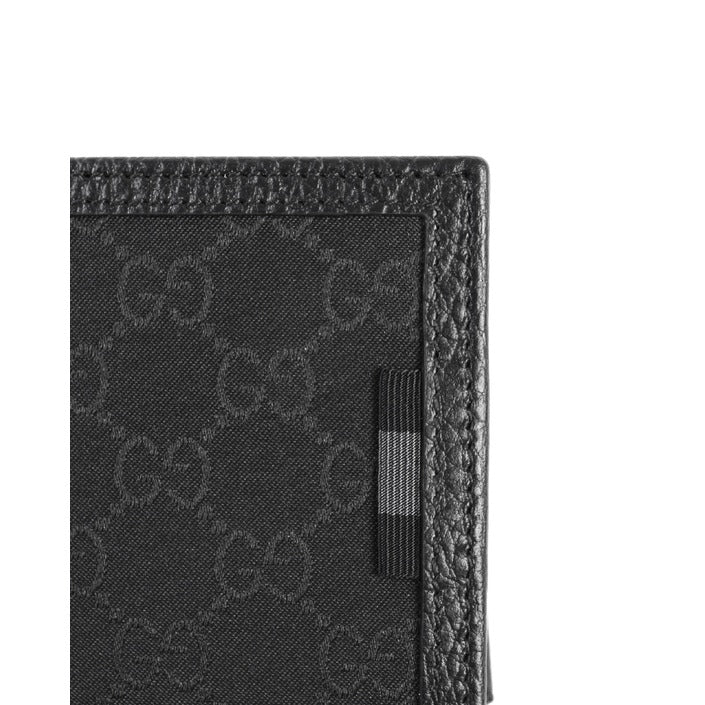 Gucci Monogram fabric and leather wallet