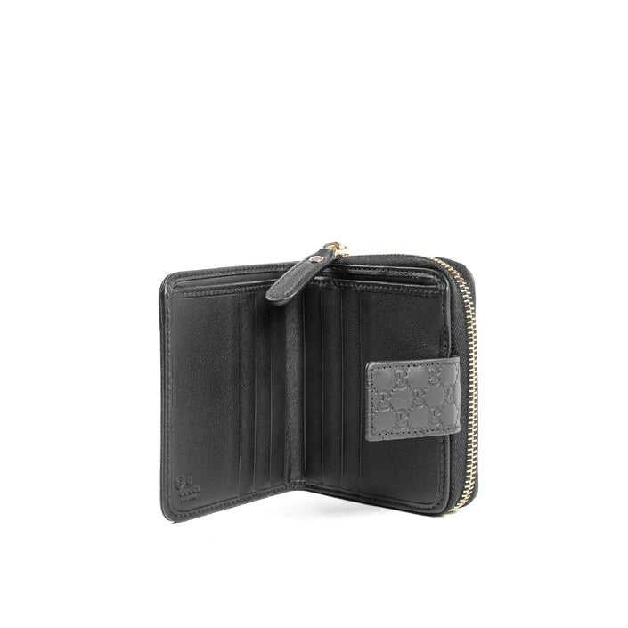 Gucci Guccissima small zipped leather wallet