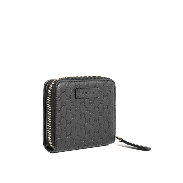 Gucci Guccissima small zipped leather wallet